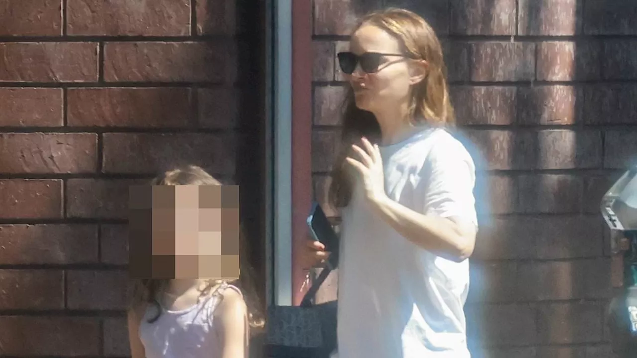 Natalie Portman cuts a casual figure as she enjoys some retail therapy with her daughter Amalia, 7,...