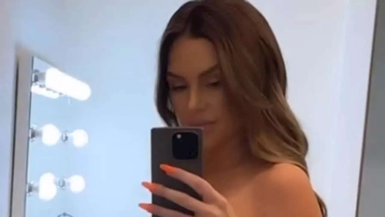 Pregnant Lala Kent poses nude as she shows off her blossoming baby bump in new video: 'Baby S is...