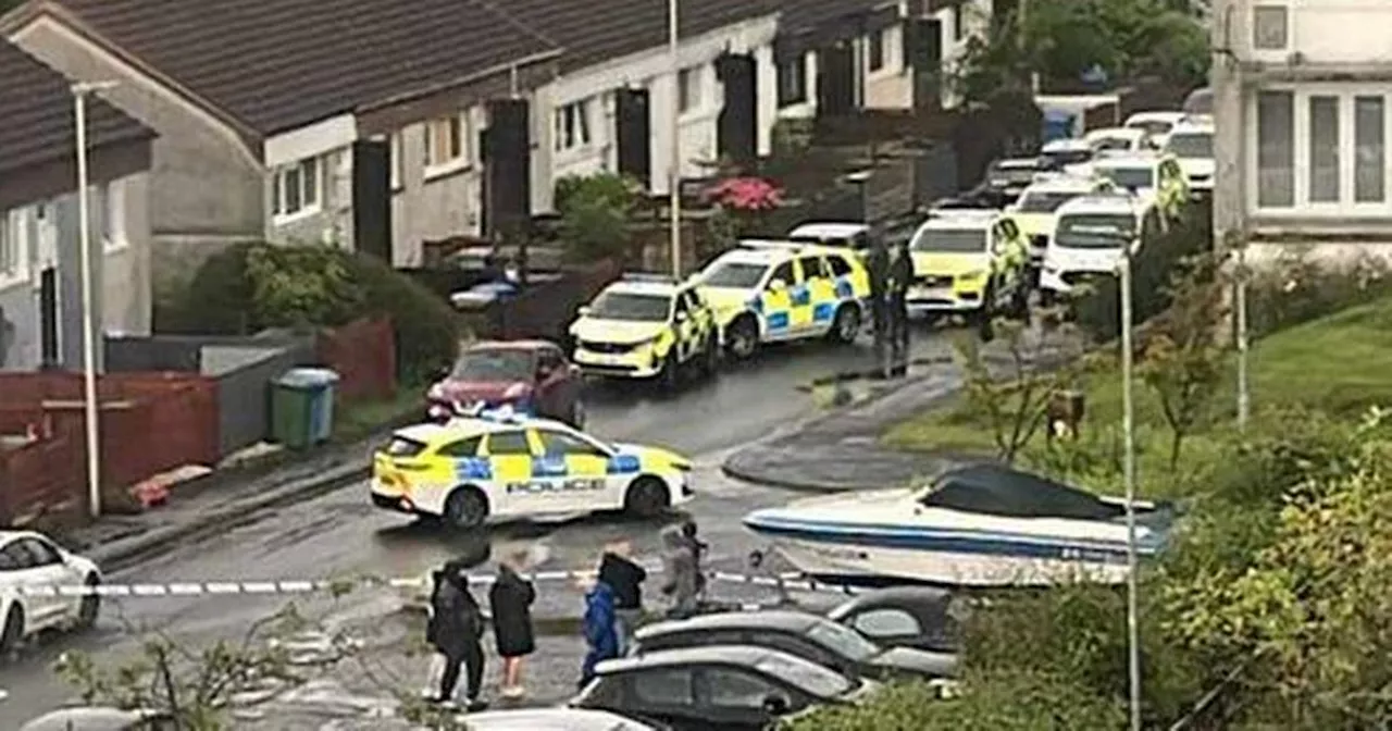 Armed police swarm East Kilbride in ongoing incident as road taped off