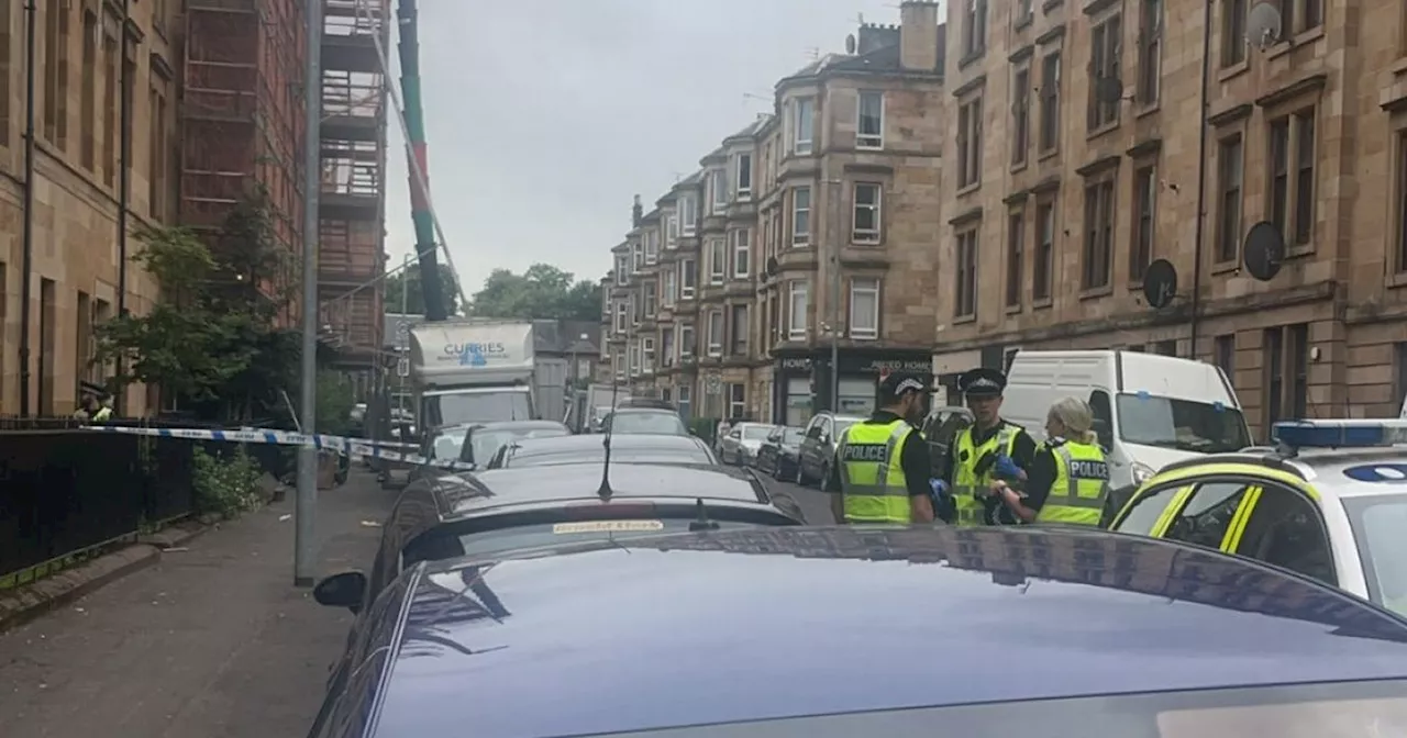 Man assaulted in Glasgow's Govanhill as police swoop on area and tape off flat