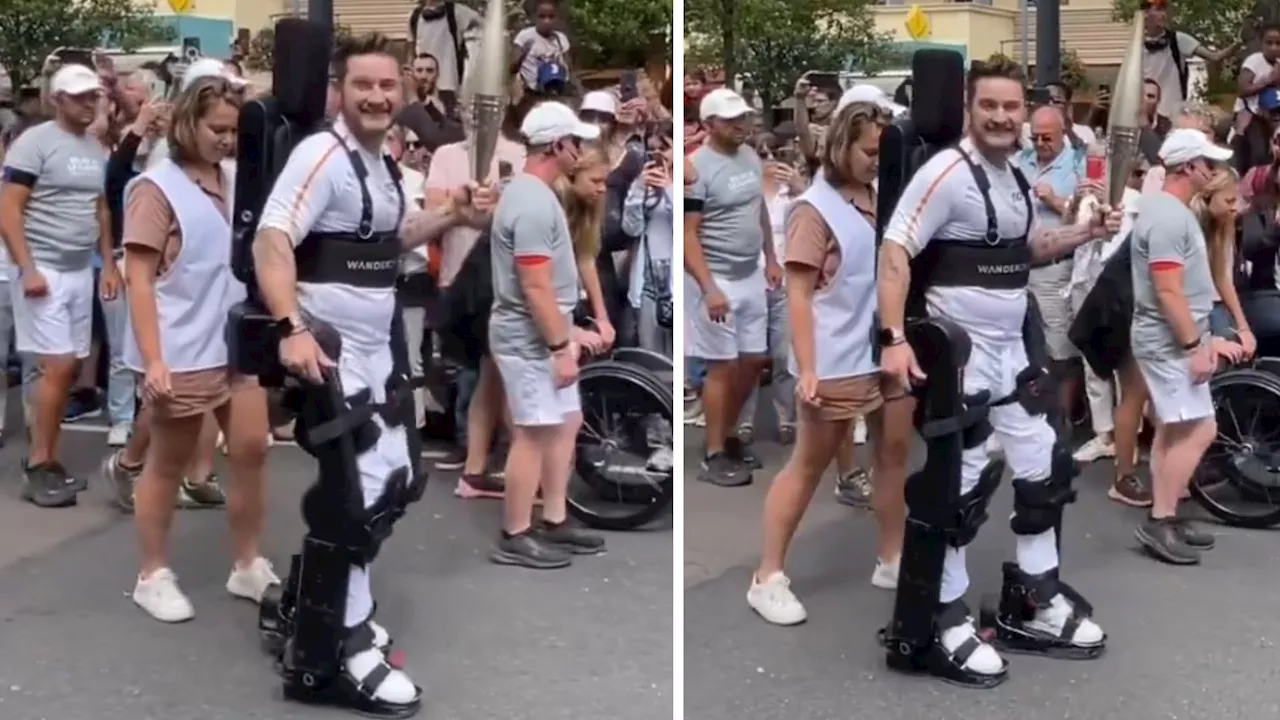 AI-powered robotic exoskeleton enables paraplegic athlete carry Olympic flame
