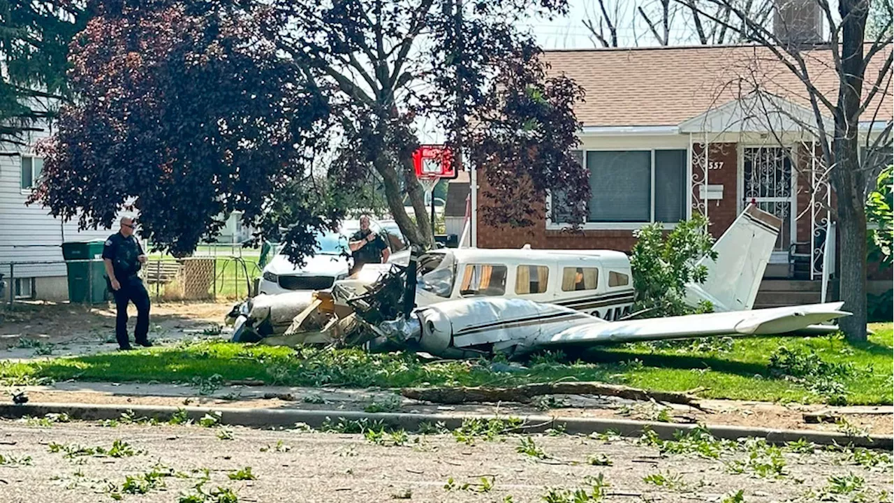 PHOTOS: Plane crashes in front yard of home near Ogden Hinckley Airport