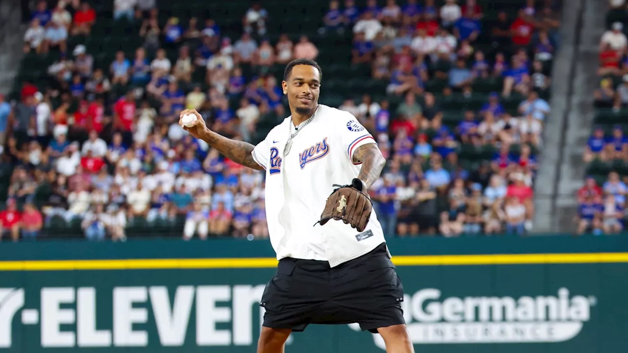 Dallas Mavericks' P.J. Washington Throws First Pitch at Texas Rangers Game