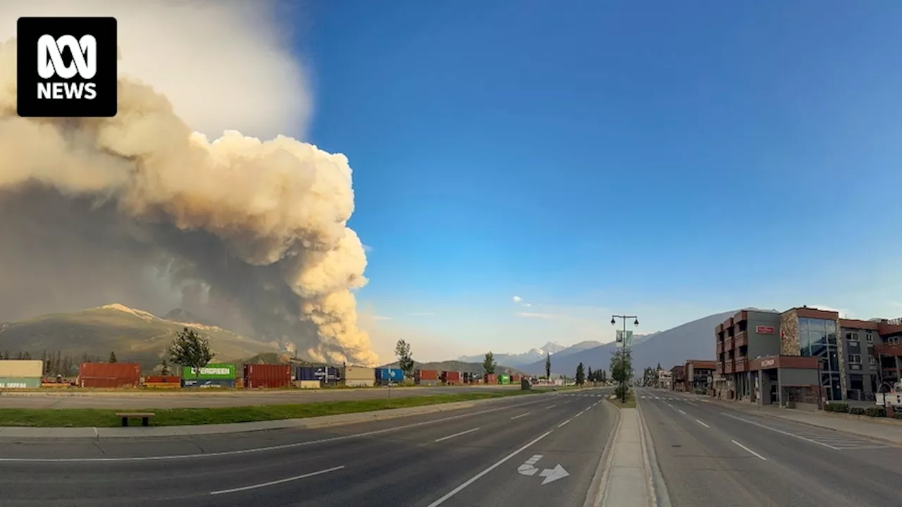 Canadian town of Jasper encircled by 'monster' wildfires with half of town possibly damaged