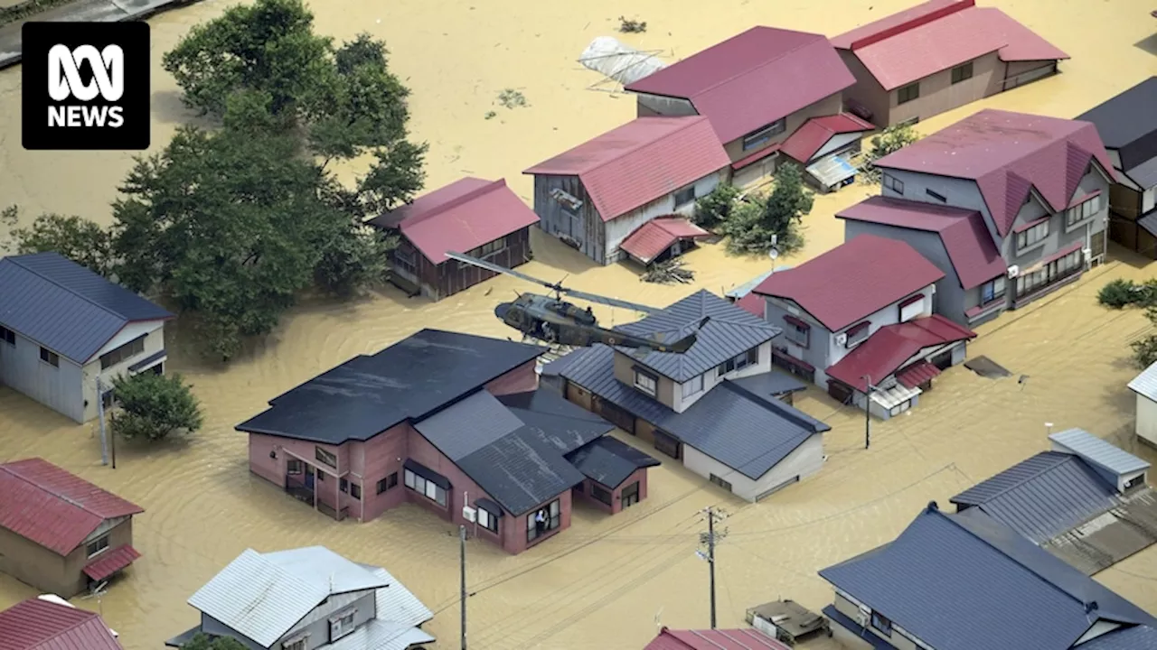 Record rainfall sees thousands evacuated in northern Japan as flooding kills two people and displaces thousands