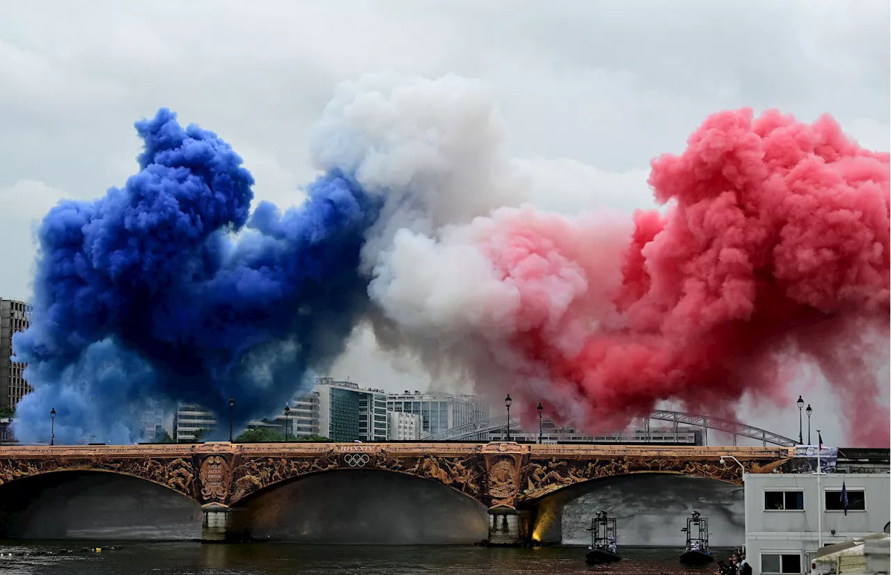 Rain, security checks fail to dampen cheer at Paris Olympics opener