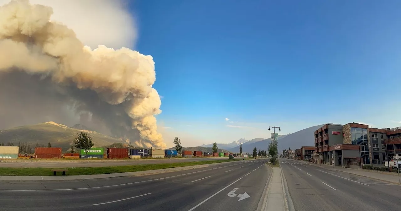 Rain may help firefighters battling blaze in Canadian tourist town