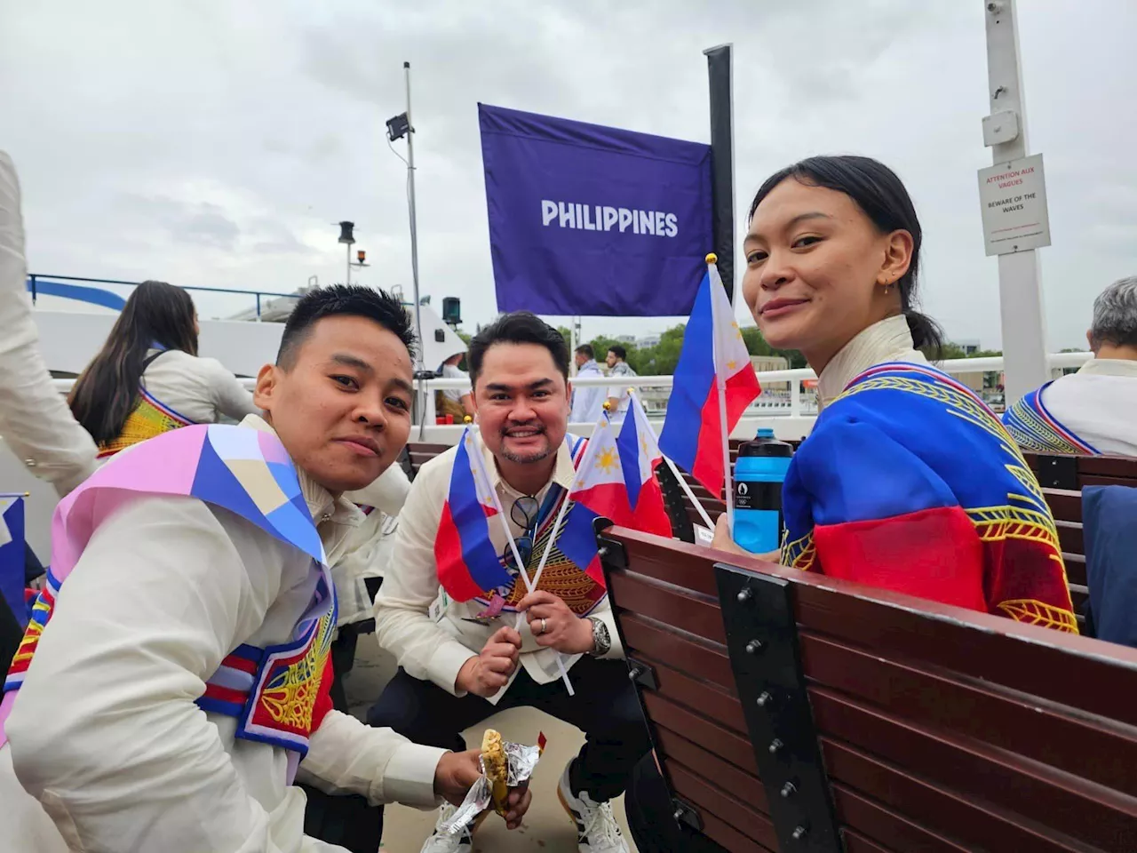 Rain couldn't drown out the cheers at the Paris Olympics opening ceremony