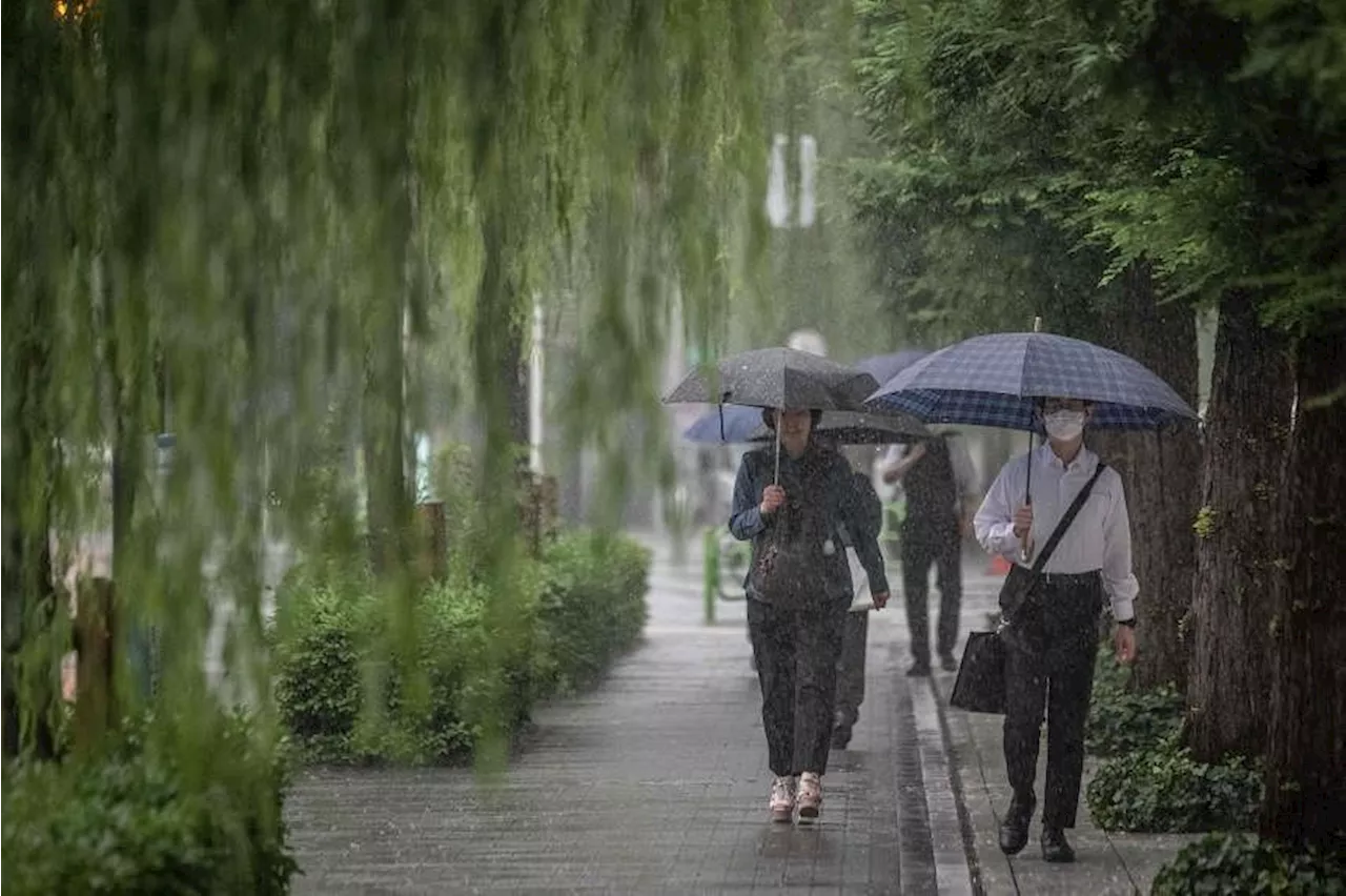 At least one dead, thousands evacuated as record rains pound northern Japan