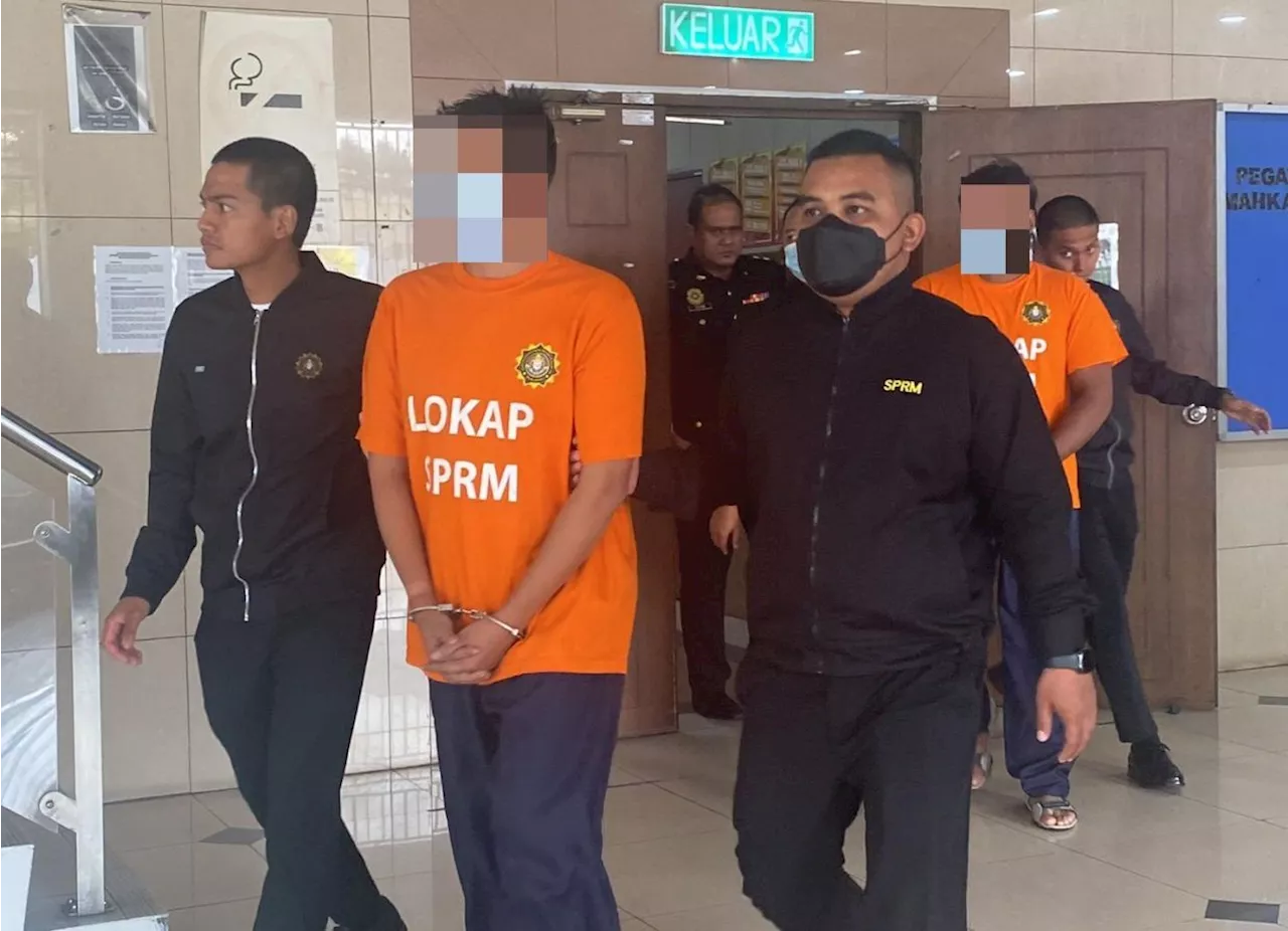 Cop and lorry driver remanded over RM10,000 bribe