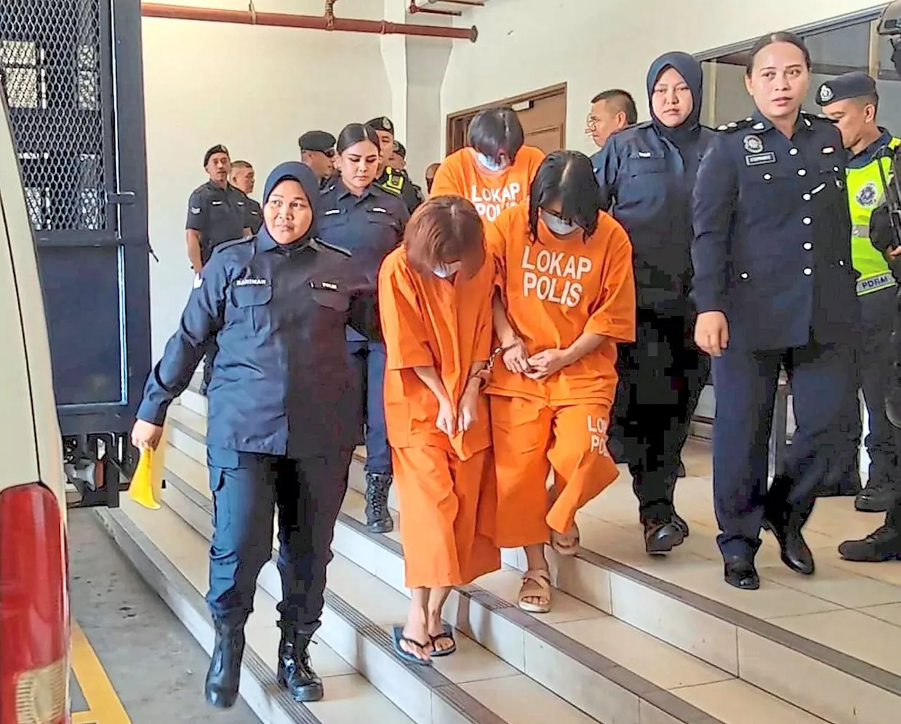 Two bank managers among 10 charged over RM24.2mil case