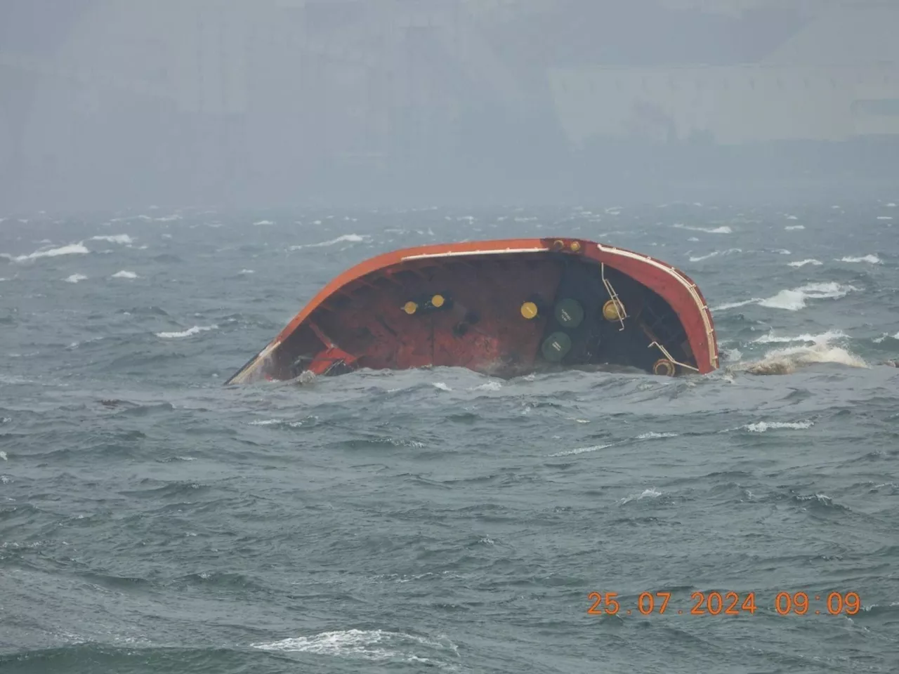 PCG starts operations to contain oil spill, finds body of missing crew