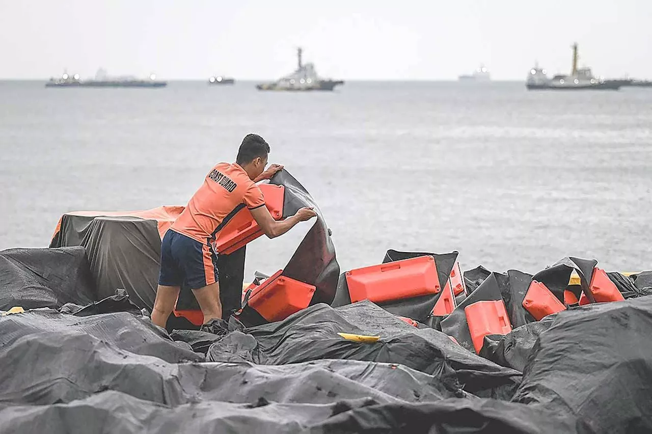 Race on to contain Bataan oil spill