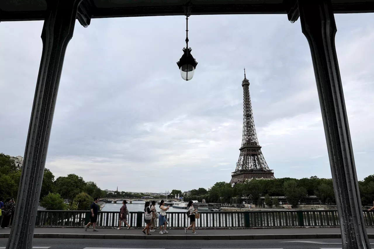 Paris Olympics live updates: Crowds swell, rain falls at Opening Ceremonies