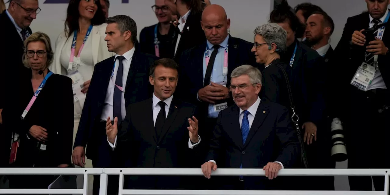 Paris Olympics begins with ambitious but rainy opening ceremony on the Seine River