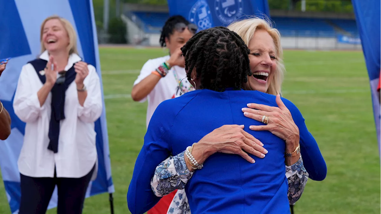 Jill Biden meets with US Olympic athletes in Paris &mdash; and even helps with a relay drill