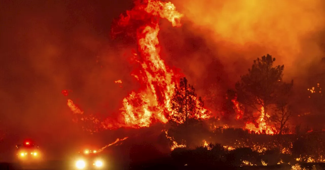 California's largest wildfire explodes in size as fires rage across US West