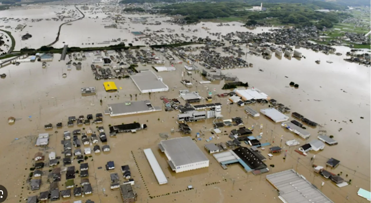 Thousands evacuated as record rains pound northern Japan