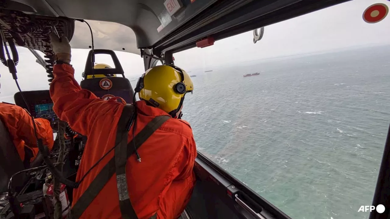 Philippine coast guard says oil leaking from sunken tanker