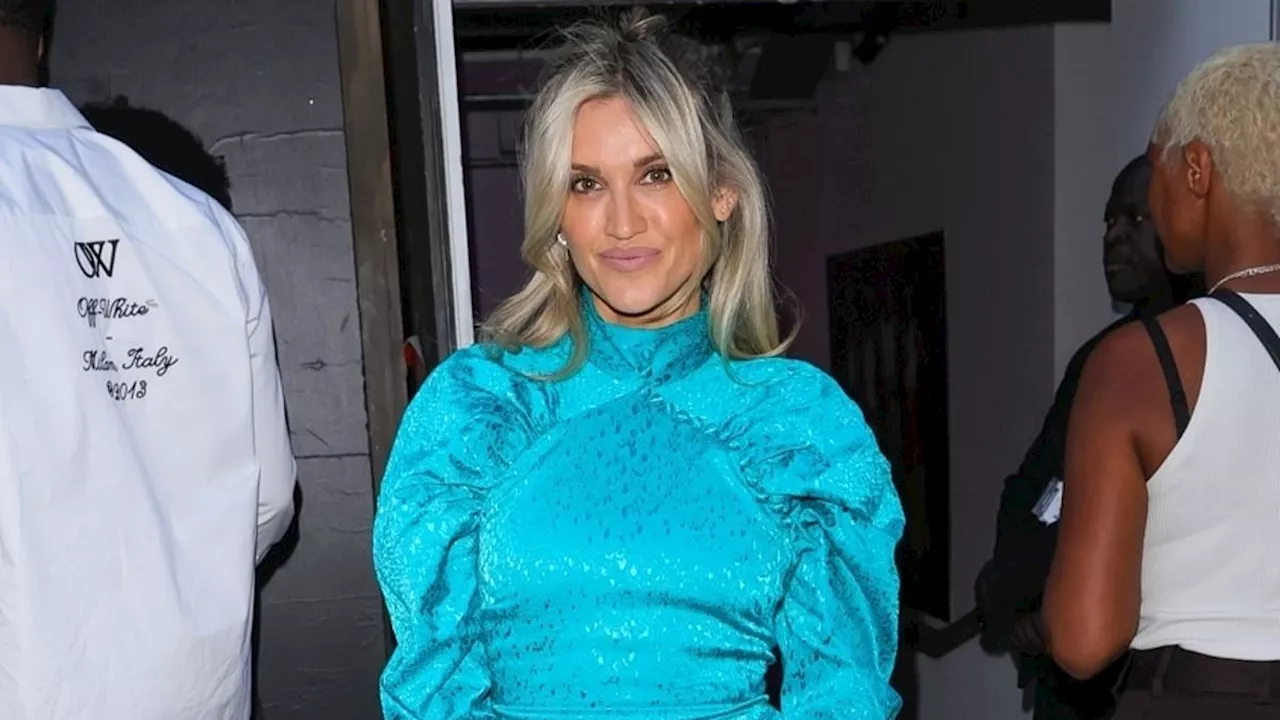 Ashley Roberts puts on a VERY leggy display in a stunning aqua mini dress as she enjoys a night out...