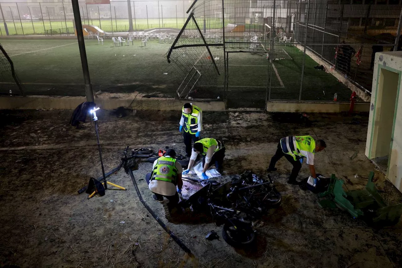 Israel says Hezbollah rocket kills 12 at football ground, vows response