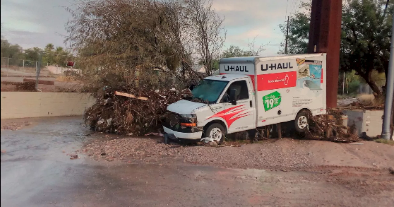 Driver, passengers of U-Haul truck rescued from Southside wash