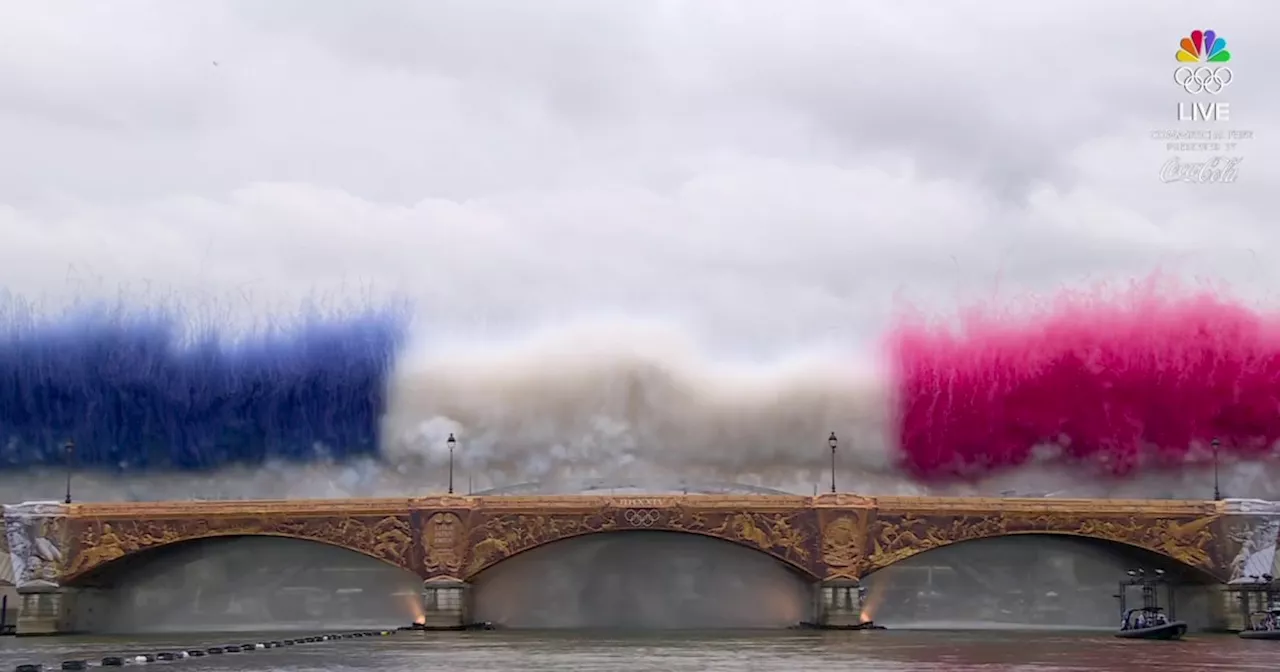 Flag-colored plumes of smoke burst from Paris bridge at Olympics ...