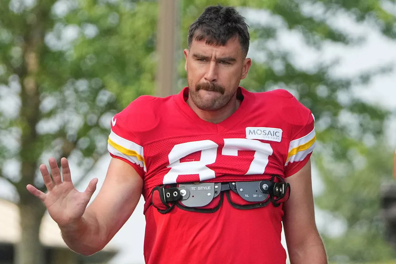 Travis Kelce Sweetly Throws Gloves to Young Taylor Swift Fan at Kansas City Chiefs Training Camp