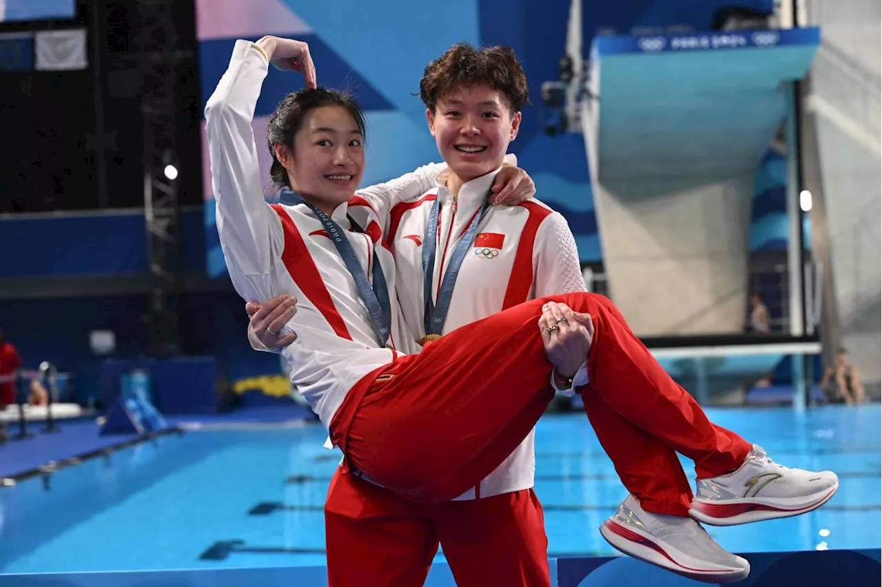 China divers Yiwen and Yani win first Olympics gold in clean sweep bid