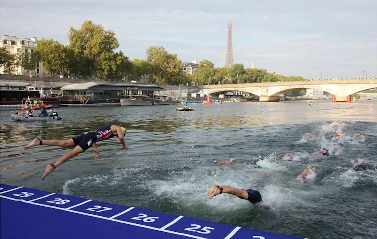 Olympics-Organisers confident triathlon will go ahead despite rain impact on Seine