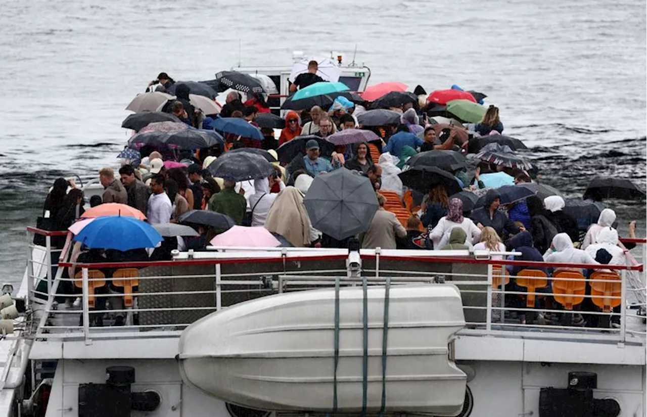 Pouring rain disrupts Games after drenched opening ceremony