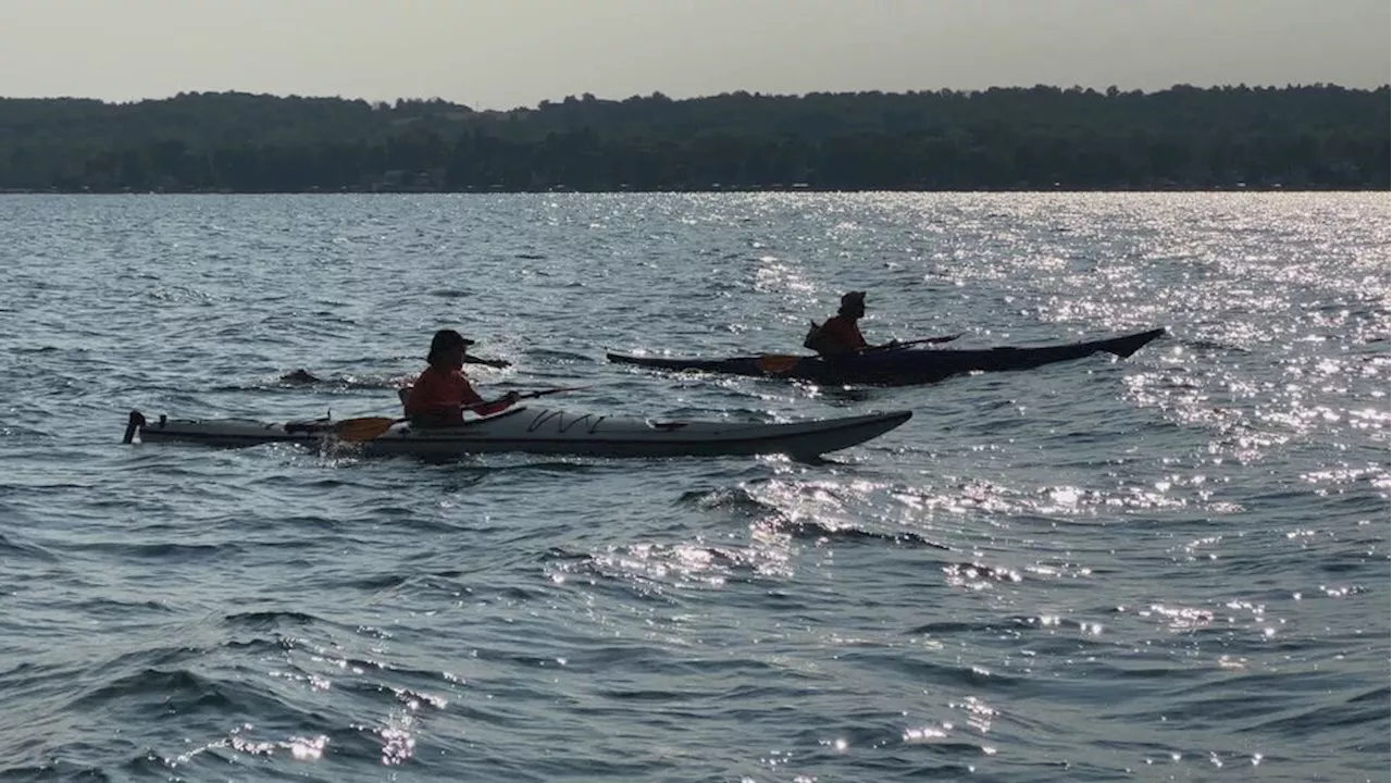 Friends reunite for a nostalgic swim across Canandaigua Lake after 40 years