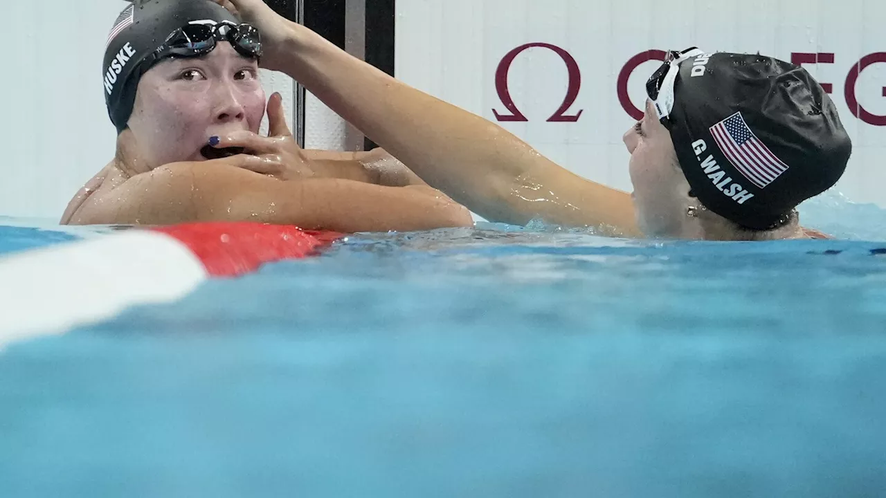 American swimmer Torri Huske edges teammate Gretchen Walsh by just .04 seconds in 100 butterfly