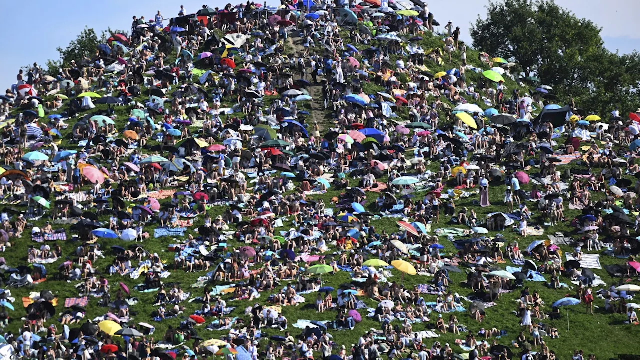 Swifties swarm a hill in Munich to watch The Eras Tour for free