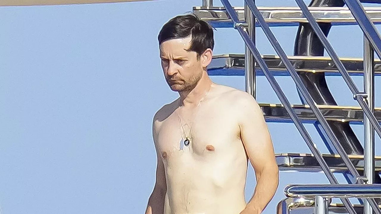 Tobey Maguire, 49, enjoys a luxurious vacation on a yacht with a bikini-clad mystery woman in...