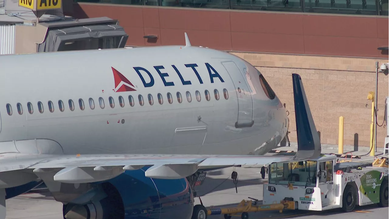 Delta plane clips parked aircraft at terminal of Salt Lake City International Airport