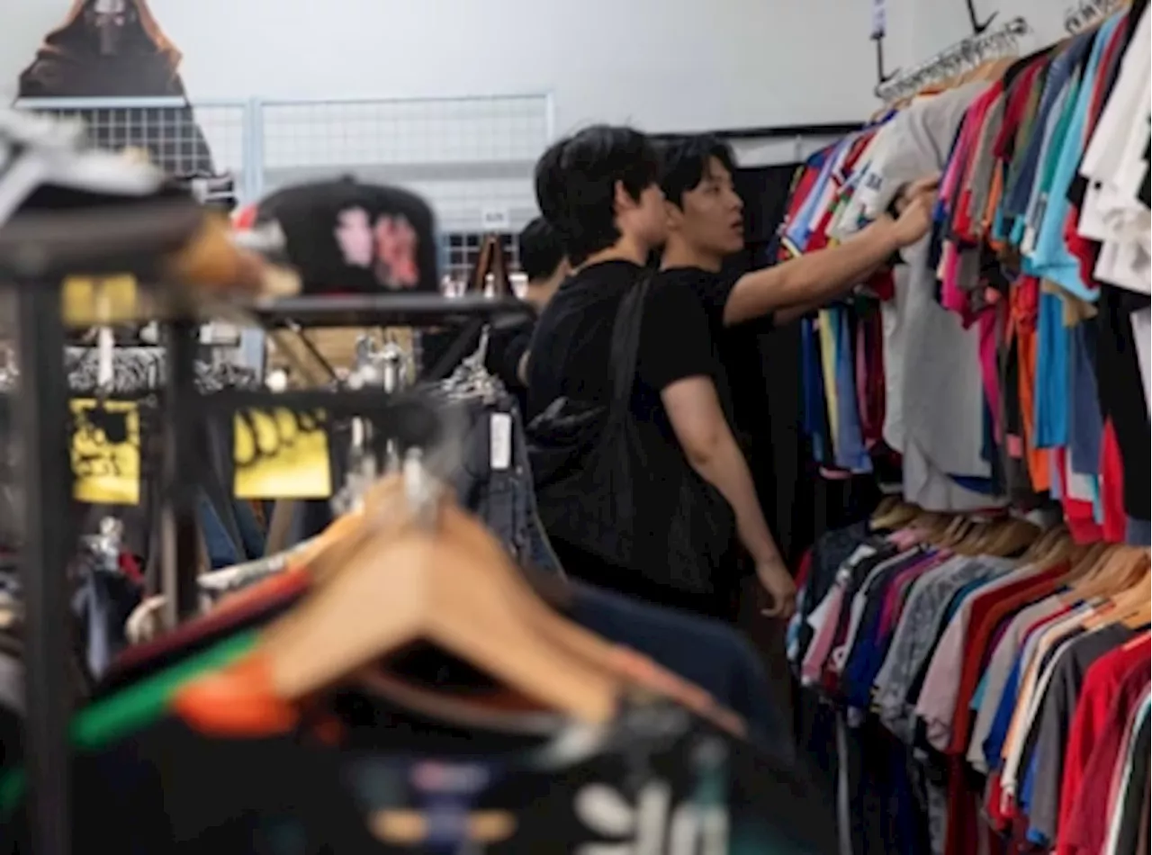 Where did this secondhand shirt come from? As thrift shops expand in Singapore, youths question source