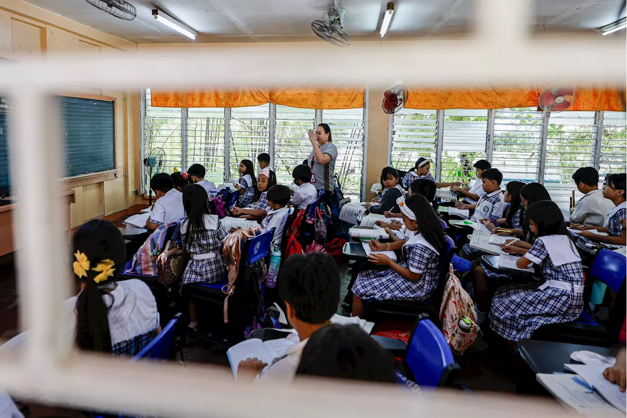 Philippine schools open even as flooded areas pick up the pieces