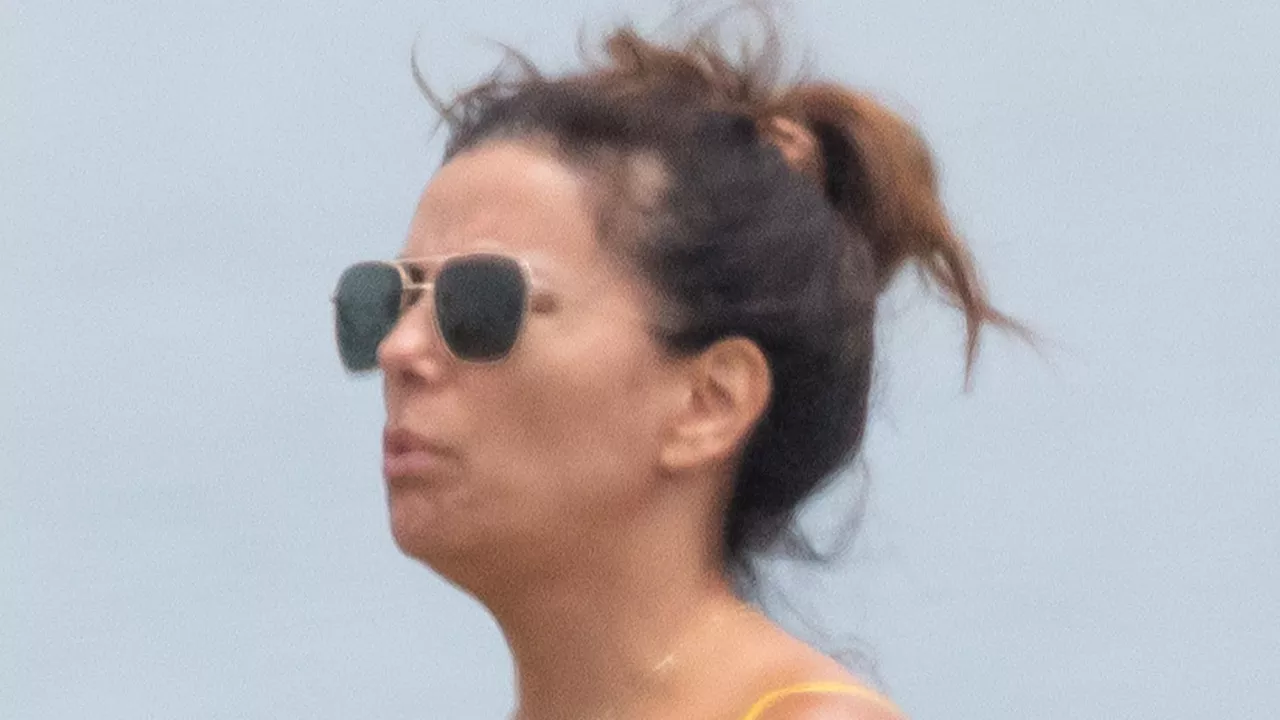 Eva Longoria, 49, defies her age as she reveals stunning beach body in teeny bikini during vacation in...