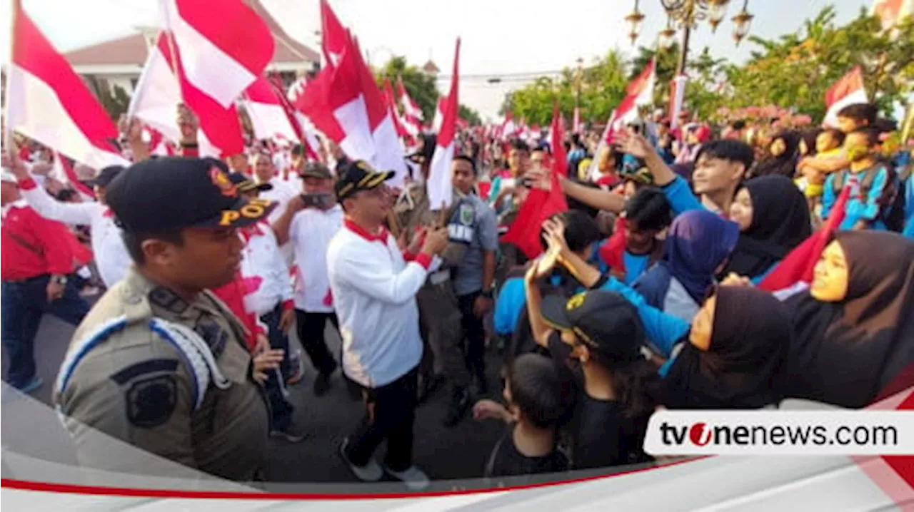 Sambut Hari Kemerdekaan, 10.000 Bendera Merah Putih Dibagikan Gratis Kepada Warga Kota Madiun