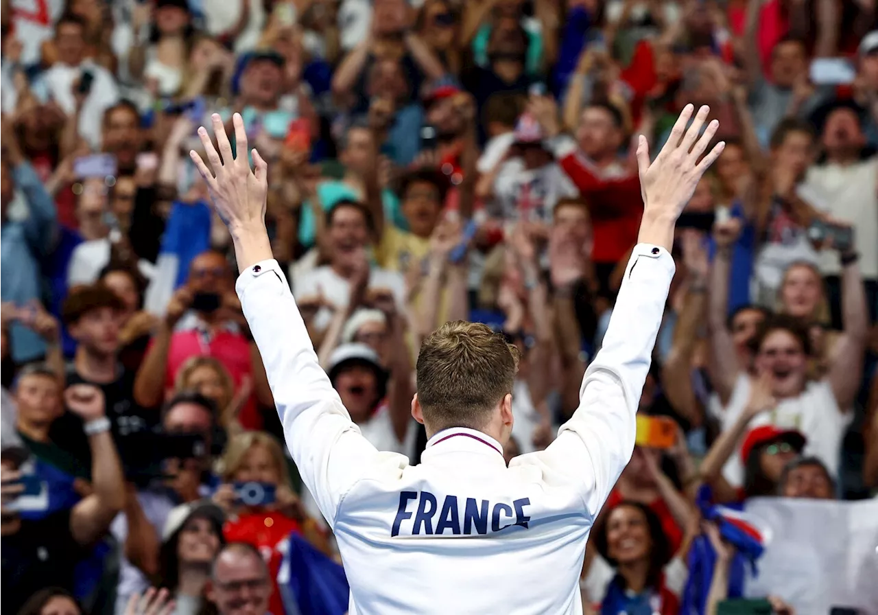 Leon Marchand lands gold, an Olympic record and France’s collective heart