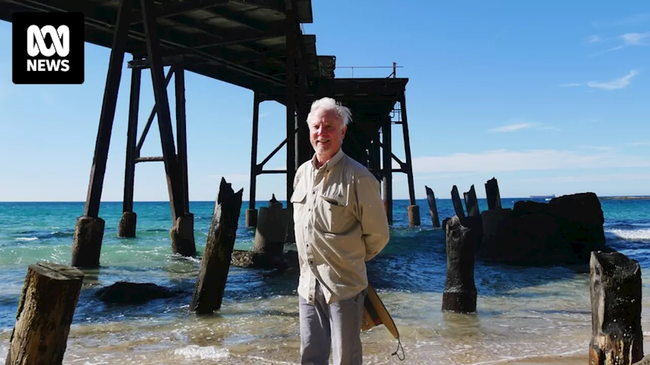 Catherine Hill Bay residents save century-old wood from mining jetty to make Stonehenge-like sculpture