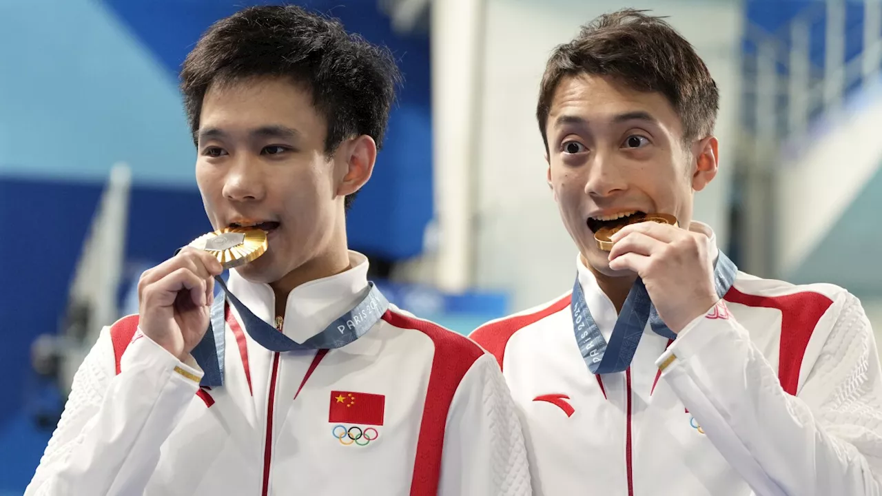 China claims diving record with its 49th Olympic gold medal, surpassing the United States