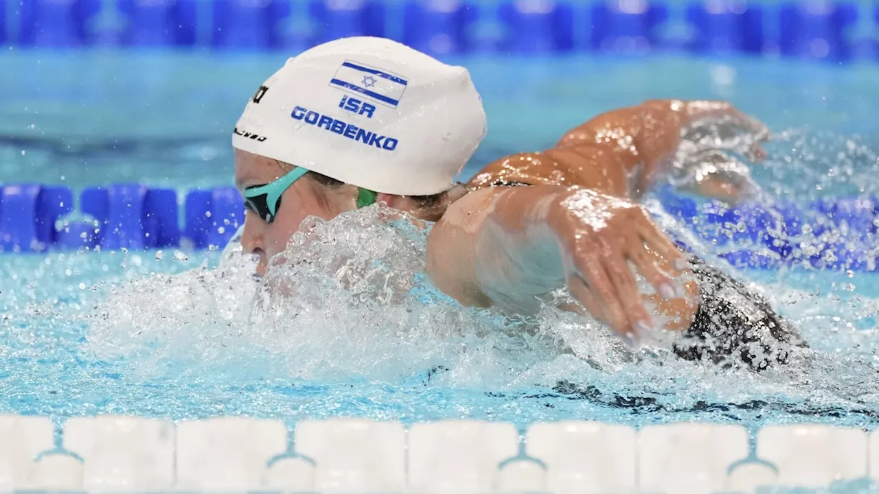 Israeli swimmer of Ukranian parents tries to forget conflicts as she competes at the Olympics