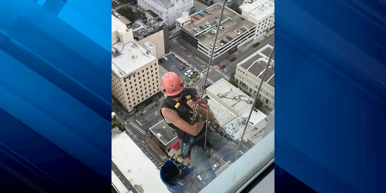 MFRD rescues man hanging on side of RSA Tower