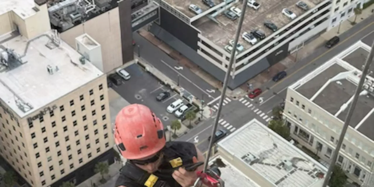 Window Washer rescued from RSA Tower after being stuck more than 450 feet above Downtown Mobile