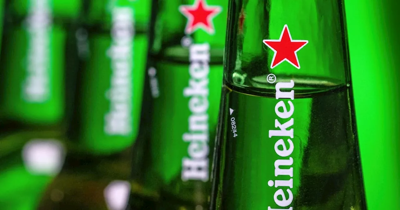 Heineken raises full-year profit guidance despite net loss in first half