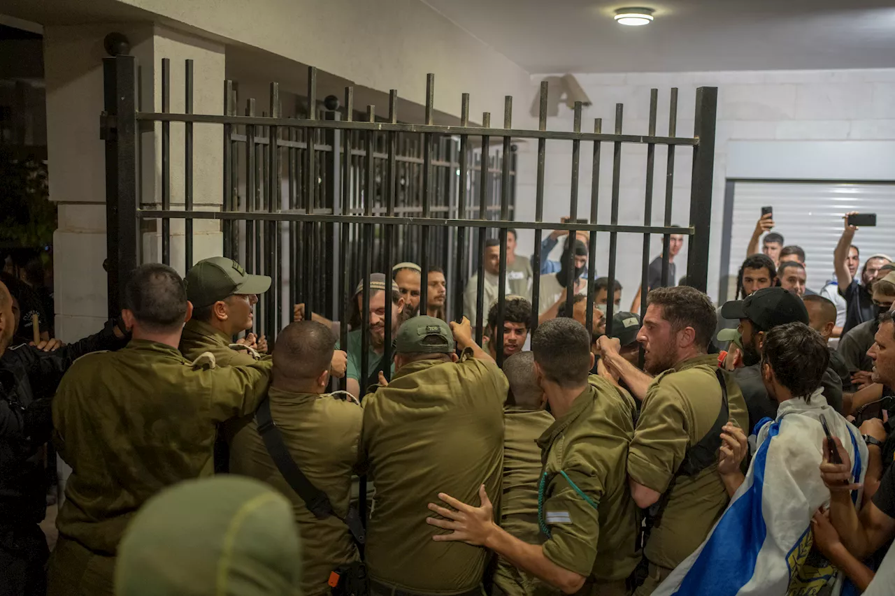 Israeli military detains 9 soldiers over alleged abuse of a detainee at a shadowy military facility