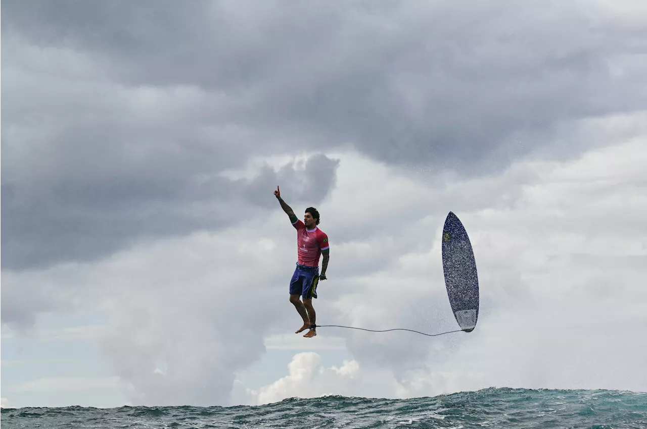 This surfer already won the Olympics with his gravity-defying pose