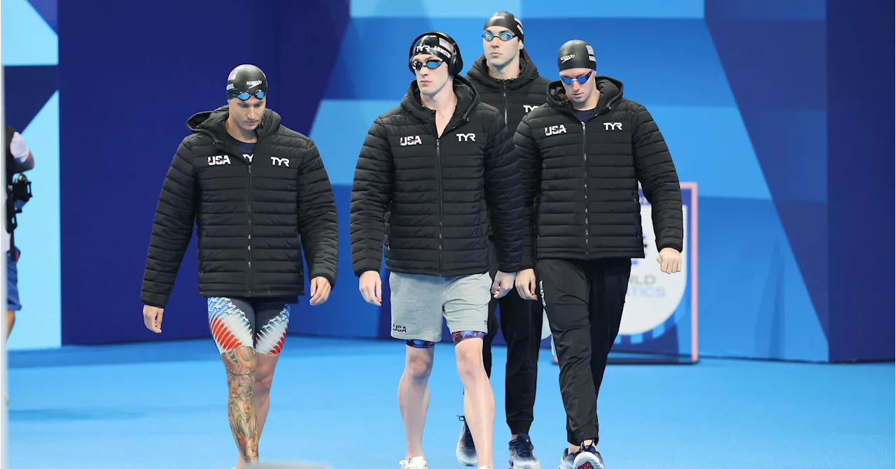 Why Olympic Swimmers Wear Coats Before a Race